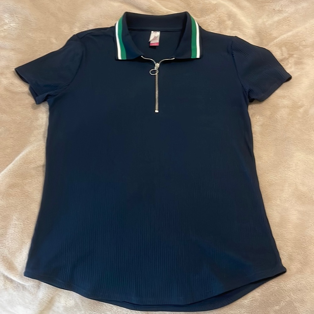 Green and white trimed Navy polo with a silver zipper collar.  Sized Medium.